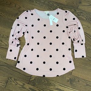 Laura women’s pink and black polka dot blouse.